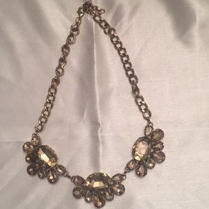 Gold toned, jeweled necklace